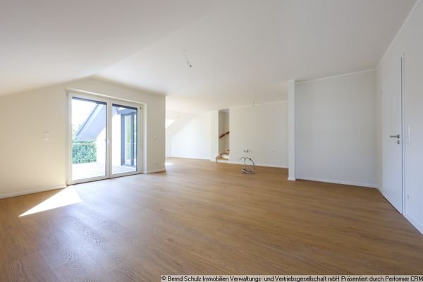 3 Wohnzimmer Blickrichtung offene Küche