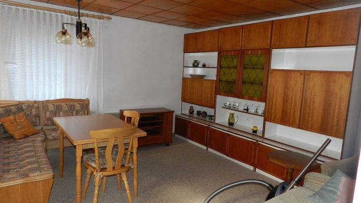 Wohnzimmer mit Zugang zur Terrasse