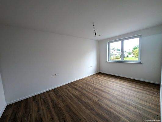 Wohnung 2 - Schlafzimmer