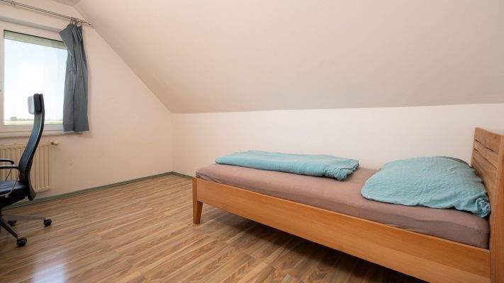 Schlafzimmer 1 Obergeschoss Haus 1