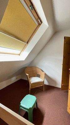 Schlafbereich mit großem Dachfenster