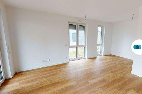 Ansicht II: Wohn- und Esszimmer mit offener Küche