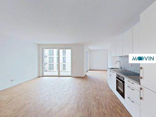 Ansicht I: Wohn- und Esszimmer mit offenem Küchenbereich