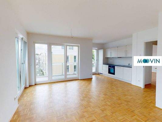 Ansicht I: Wohn- und Esszimmer mit offenem Küchenbereich