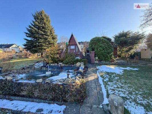 Finn Hütte mit Teich