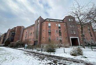 Fassadenansicht aus Backstein des Mietobjektes im Sandglöckchenweg 31 in Volkhoven