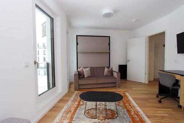 Wohnzimmer mit Schlafsofa