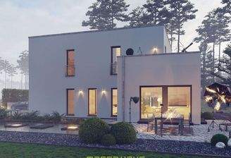 Dieses massa haus Fertighaus Einfamilienhaus im Lifestyle-Design präsentiert sich bei Dämmerung mit