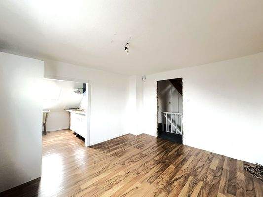 Wohnzimmer mit Anschluss an die Küche 