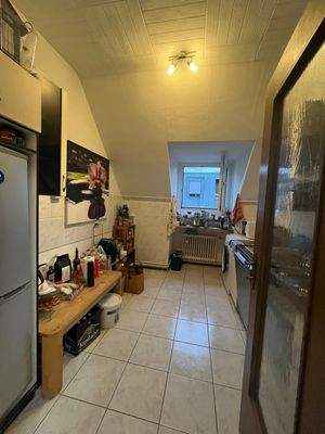 Küche in Dachgeschosswohnung