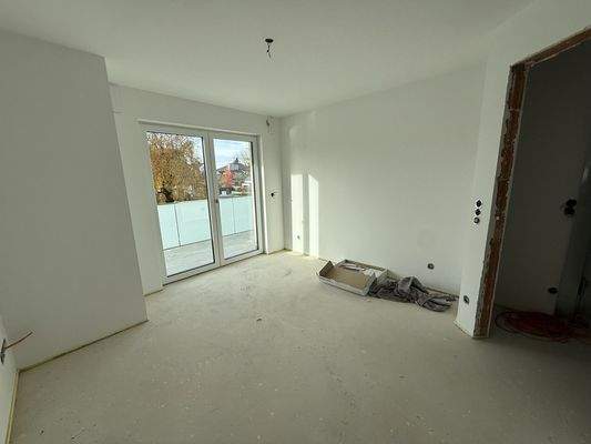 Schlafzimmer mit Balkonzugang