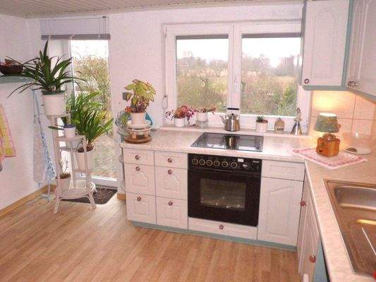 Ihre Küche mit Zugang zum Garten im Souterrain!