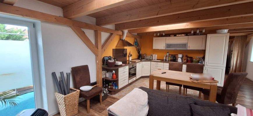 Wohnzimmer mit Küche