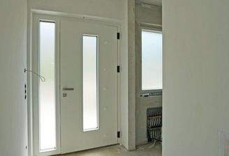 Eingangsbereich und WC (Symbolfoto von Haus 1)