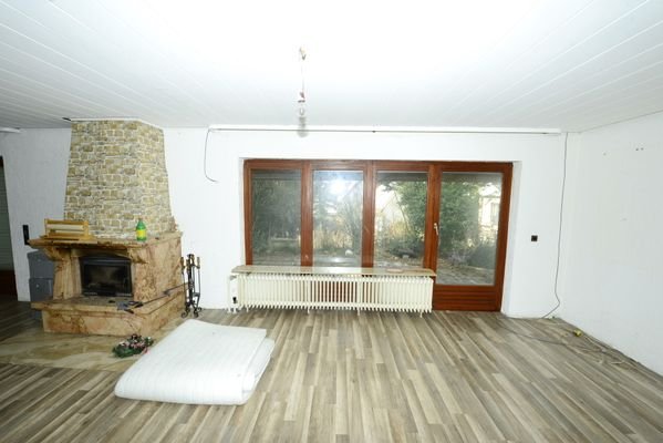 Wohn- und Eßzimmer mit Kamin
