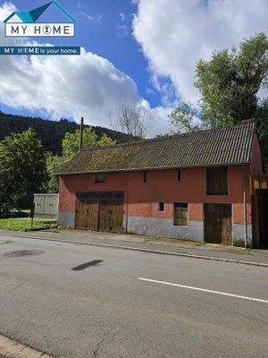  Gebäude gegenüber Haupthaus Garage/Stall etc.