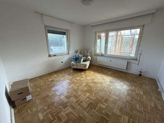 Schlafzimmer mit Parkettboden