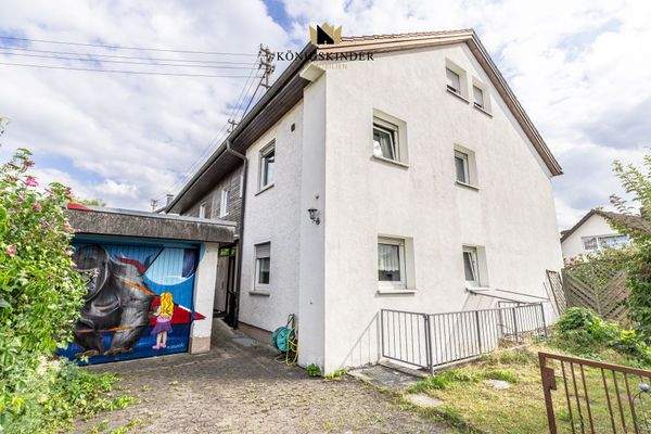 Hauszugang mit Garagenzufahrt