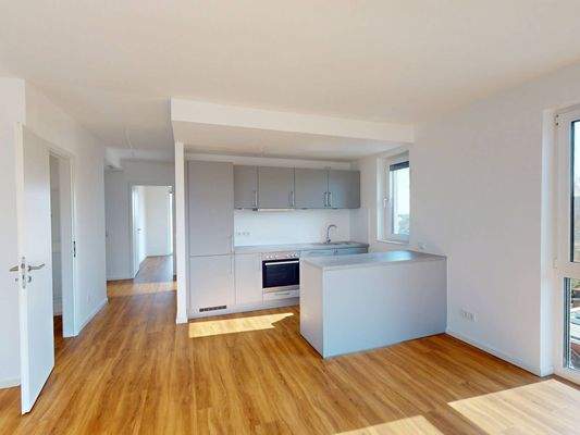 Ansicht I: Wohn- und Essbereich mit Einbauküche