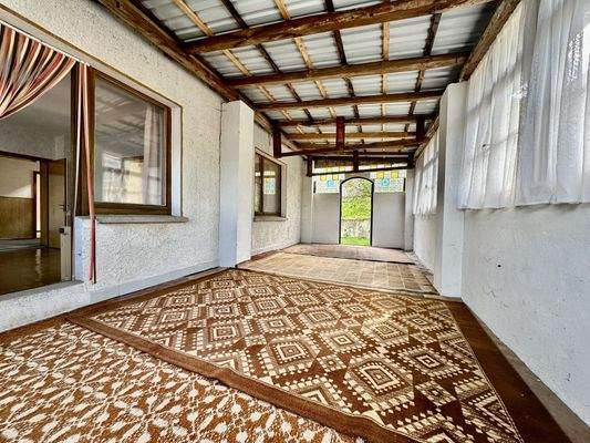 Wintergarten mit Zugang zum Garten