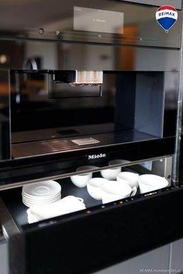 RE/MAX Immobilien DeLux