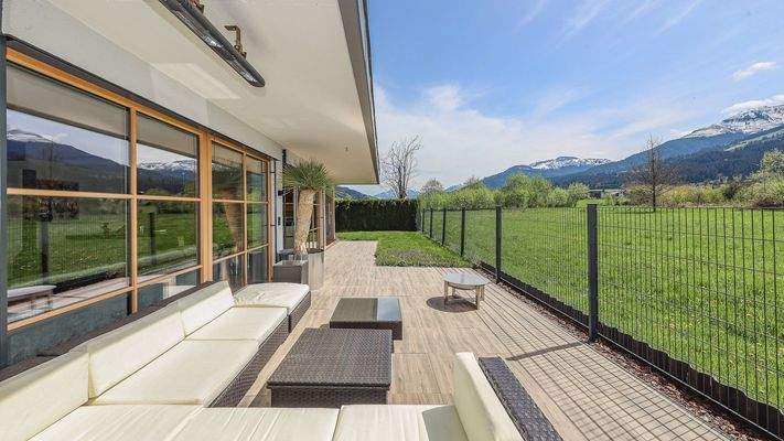 KITZIMMO-Exklusive Gartenwohnung in Toplage kaufen - Immobilien St. Johann.