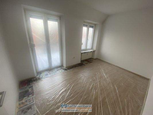 Zimmer mit Balkonzugang