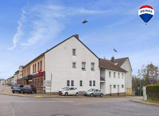 REMAX Immobilien DeLux Eigentumswohnung Seitenansicht Schwalbach Mark Borowicz