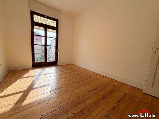 Schlafzimmer mit Balkon