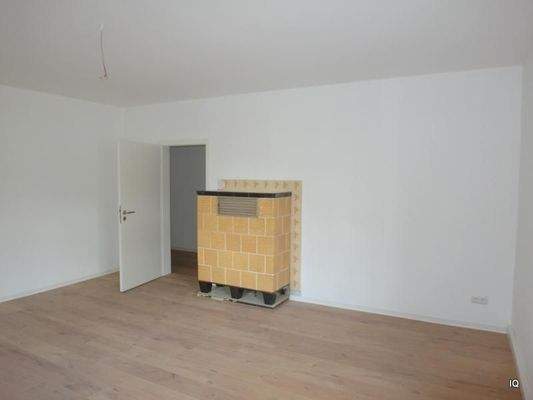 Wohnzimmer mit Ofen (von Küche aus beheizbar)