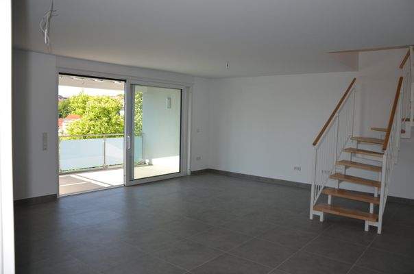 Wohn- und Esszimmer mit Loggia