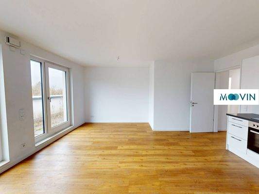 Ansicht I: Wohn- und Esszimmer mit offenem Küchenbereich