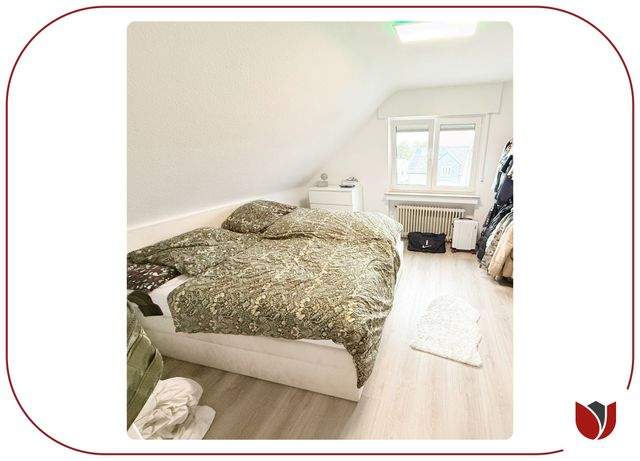 Stilvoll sanierte DG-Wohnung: Dachbalkon, Einbauküche, PKW-Stellplatz - Foto 4