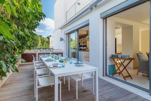 Dining area in terrace in villa in Costa d'en Blanes