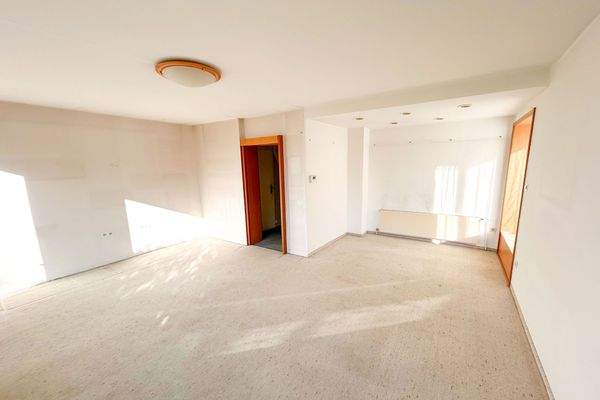 Wohn-/Esszimmer mit Terrassenzugang EG