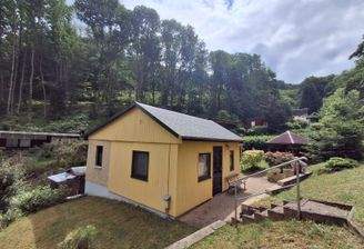 Außenansicht mit Blick Wald.jpg