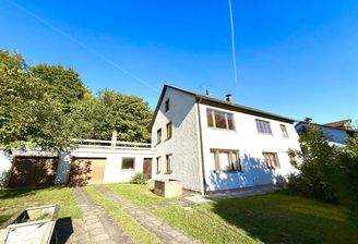 Ihr Haus mit Garagen von Westen