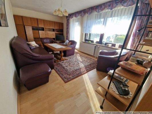 Wohnzimmer mit Zugang zum Garten