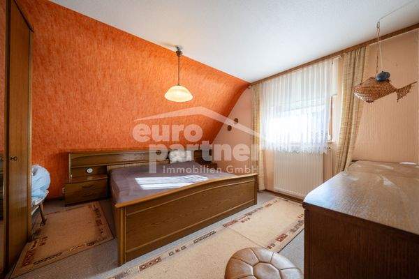 Schlafzimmer I (DG linker Gebäudeteil)