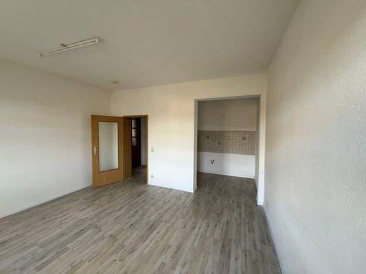 Wohnzimmer mit Küche