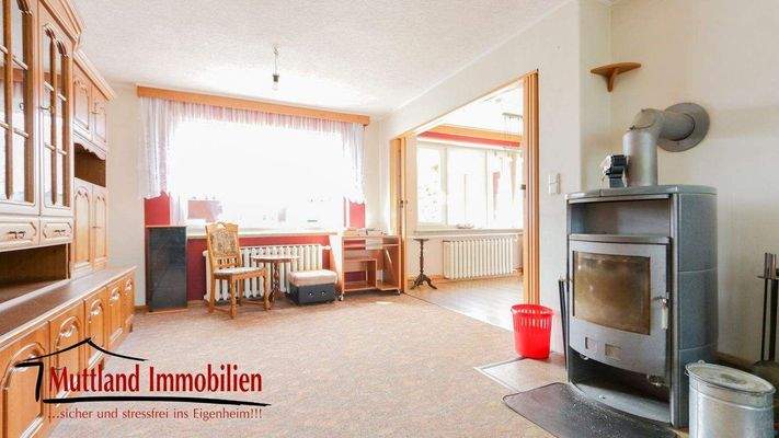 Wohnzimmer mit Kamin