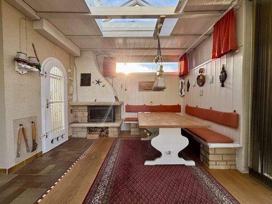 Wintergarten mit Kamin