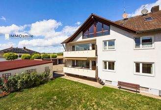Stilvolle 2-Zimmer-Dachgeschosswohnung mit Weitblick – idyllisch gelegen