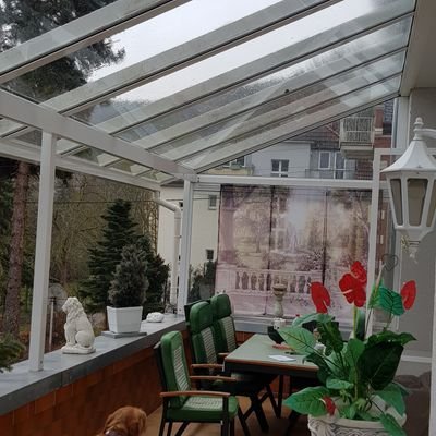 Terrasse teilweise verglast