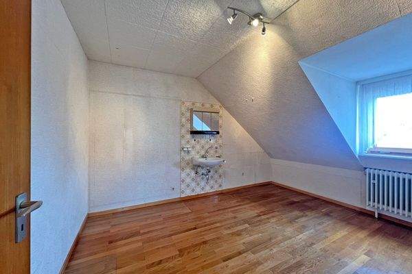 Schlafzimmer mit Waschbecken