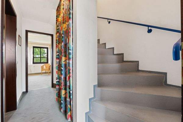 Treppenaufgang zum Dachstudio