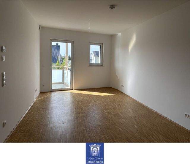 Gemütliche und hochwertige Neubauwohnung mit Balkon, EBK und Fußbodenheizung! - Foto 1