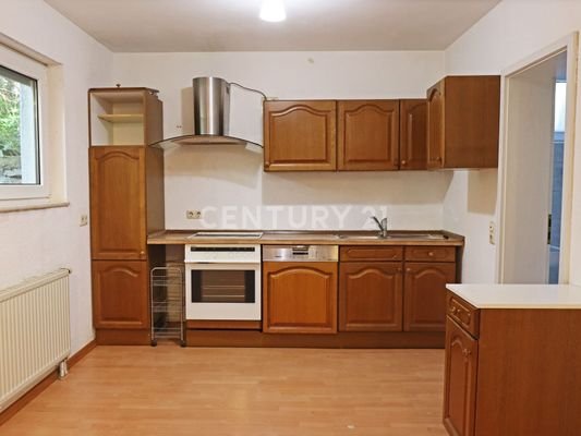 Souterrain-Wohnung im Mehrfamilienhaus