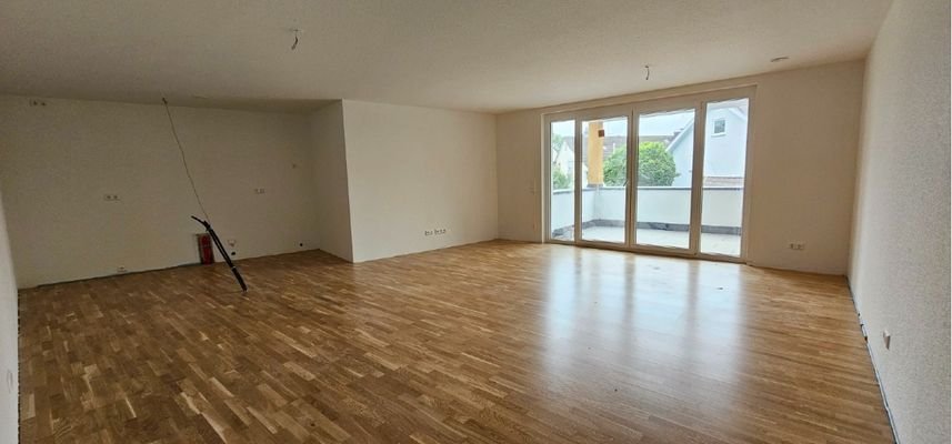 Küche-Essen Wohnen auf geräumigen 42 qm mit Zugang zum überdachten Balkon