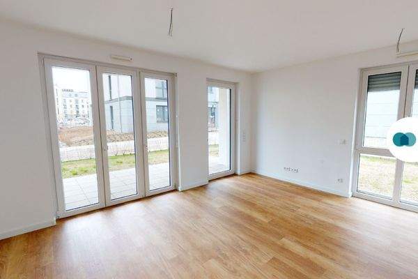 Ansicht I: Wohn- und Esszimmer mit offener Küche